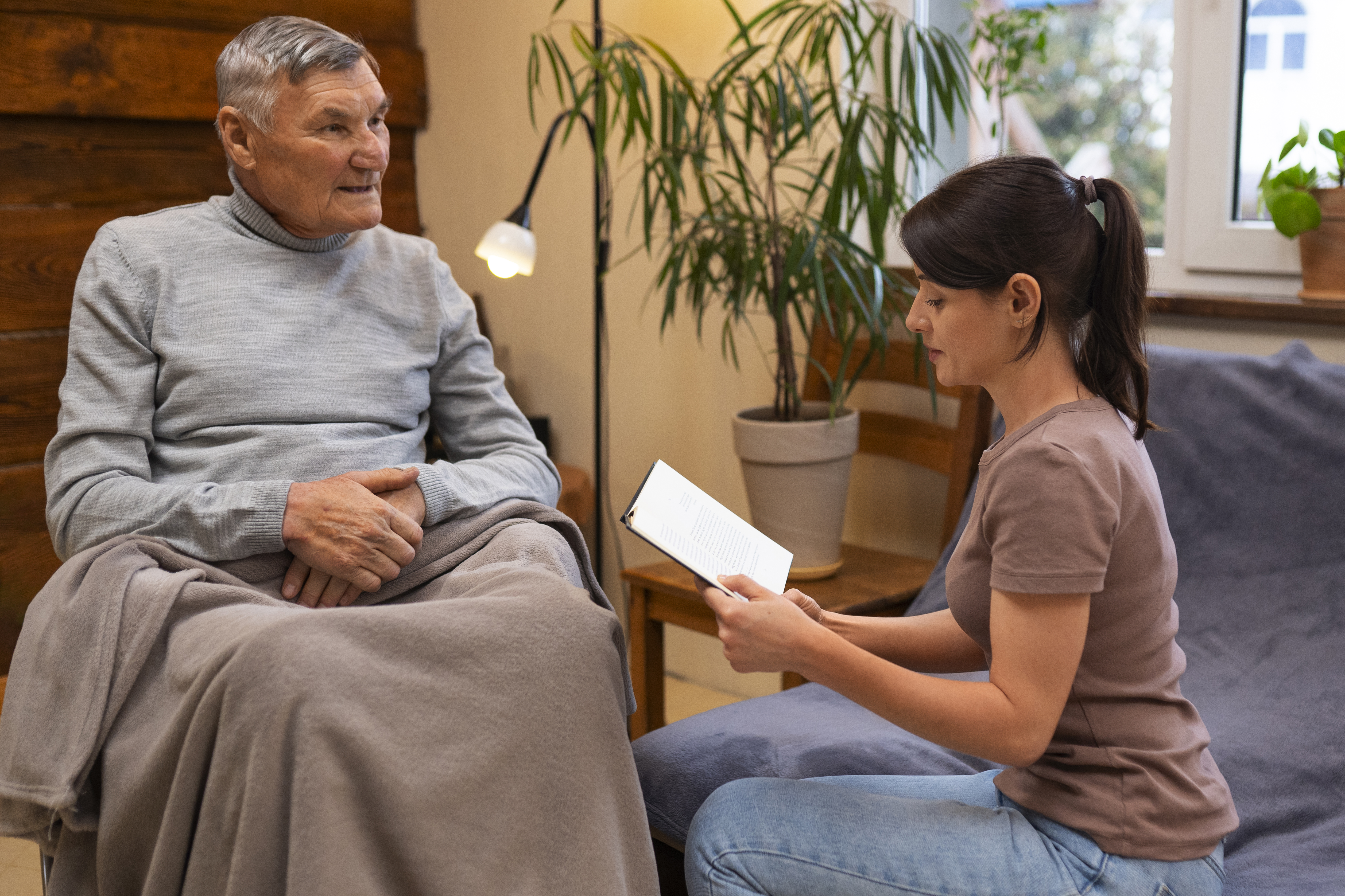 Caregiver providing in-home dementia care in Massachusetts